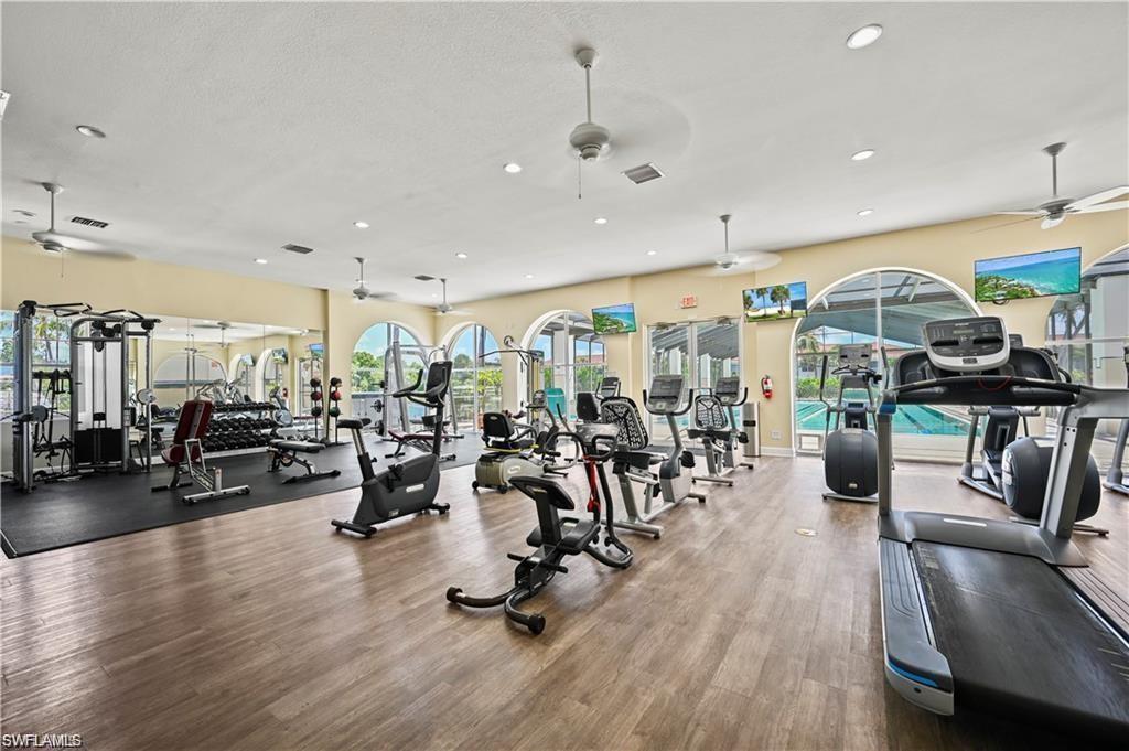 10910 Santa Margherita Road, Unit 204 Estero, FL 34135 - Photo 44 of 50 a view of a room with gym equipment