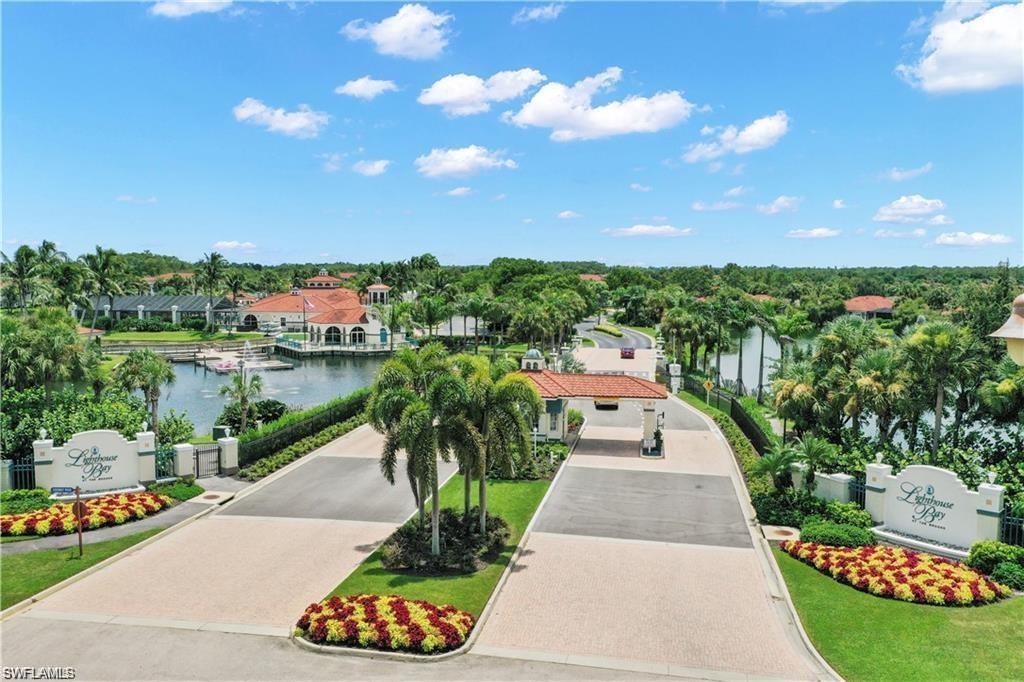10910 Santa Margherita Road, Unit 204 Estero, FL 34135 - Photo 46 of 50 a view of a garden with a patio