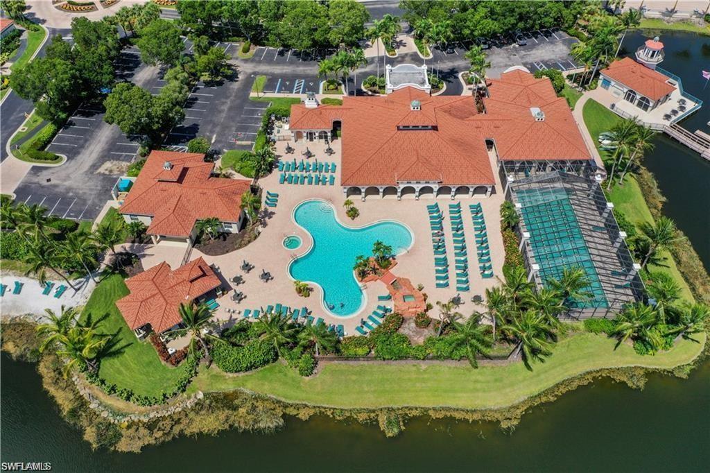 10910 Santa Margherita Road, Unit 204 Estero, FL 34135 - Photo 49 of 50 an aerial view of residential houses with outdoor space and street view