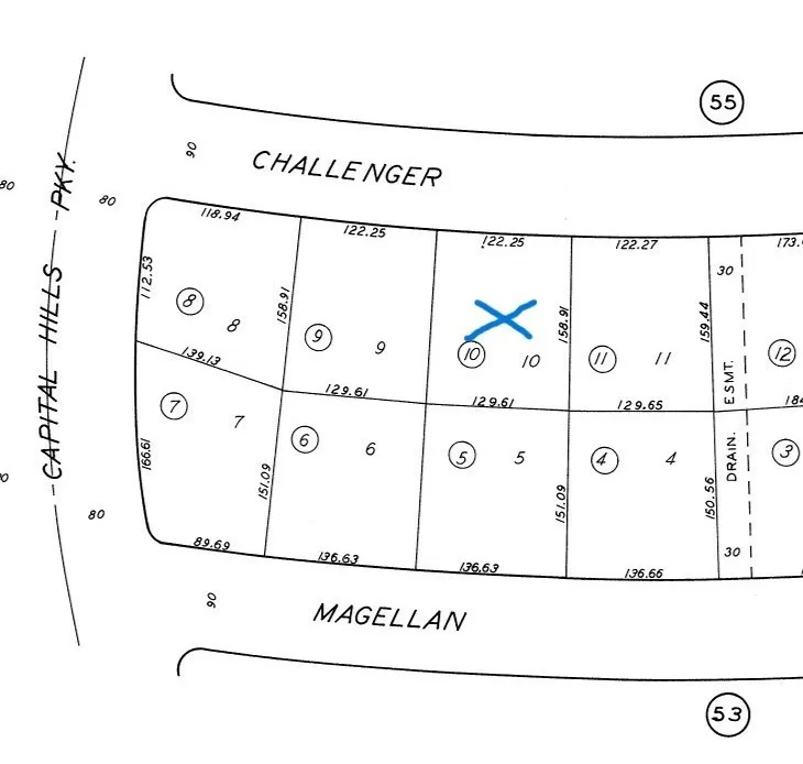 a picture of a with a white wall and a white refrigerator