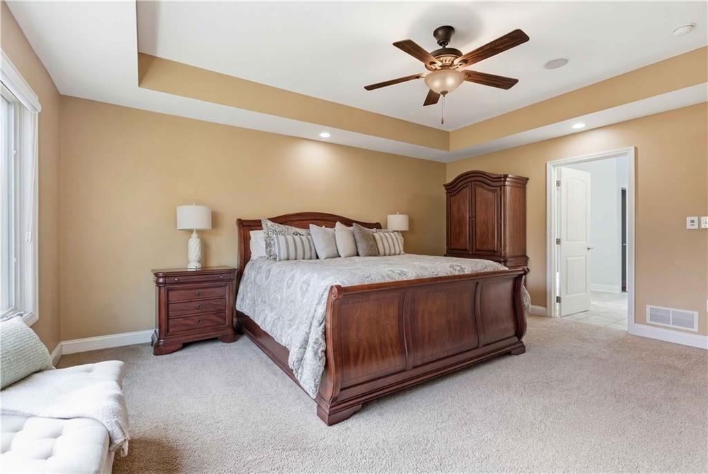 280 Sienna Trail Venetia, PA 15367 - Photo 20 of 37 a bedroom with a bed and a ceiling fan
