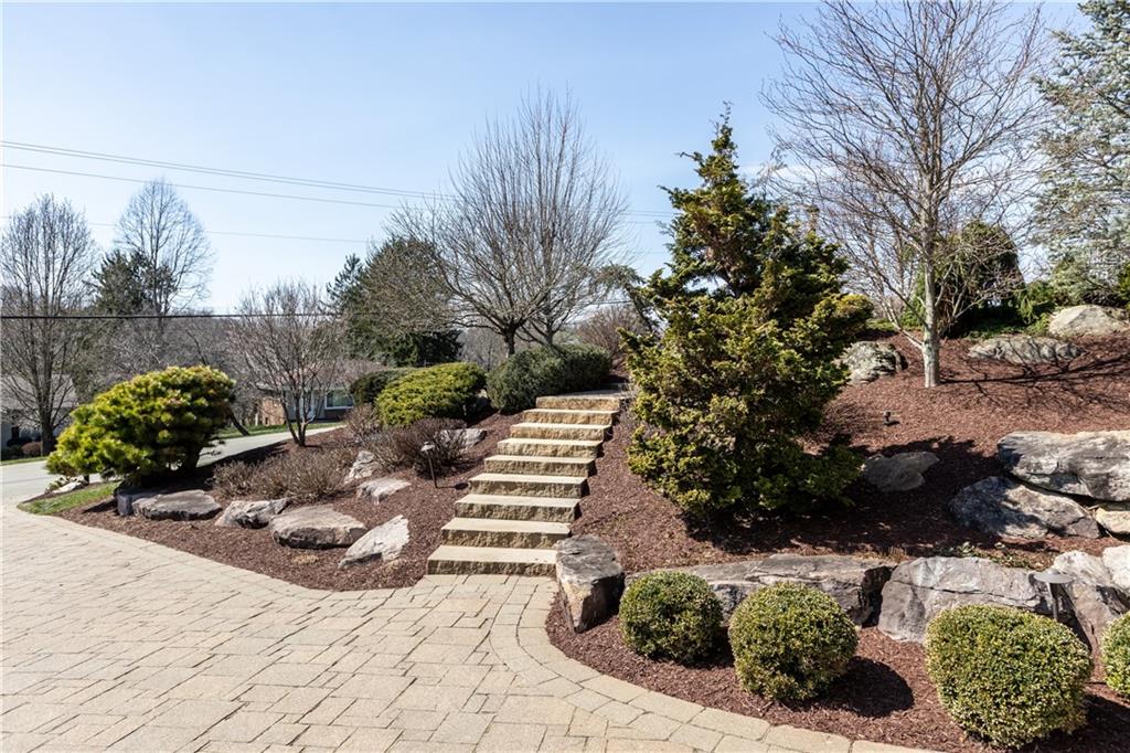280 Sienna Trail Venetia, PA 15367 - Photo 2 of 37 a view of a garden with plants and trees