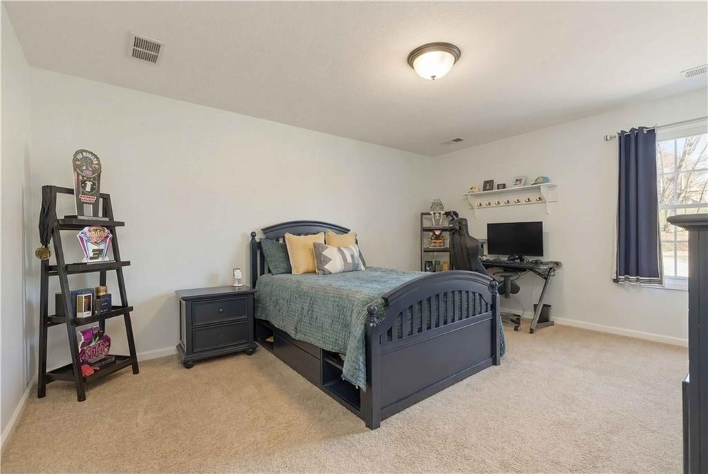 280 Sienna Trail Venetia, PA 15367 - Photo 23 of 37 a bedroom with a bed and a tv