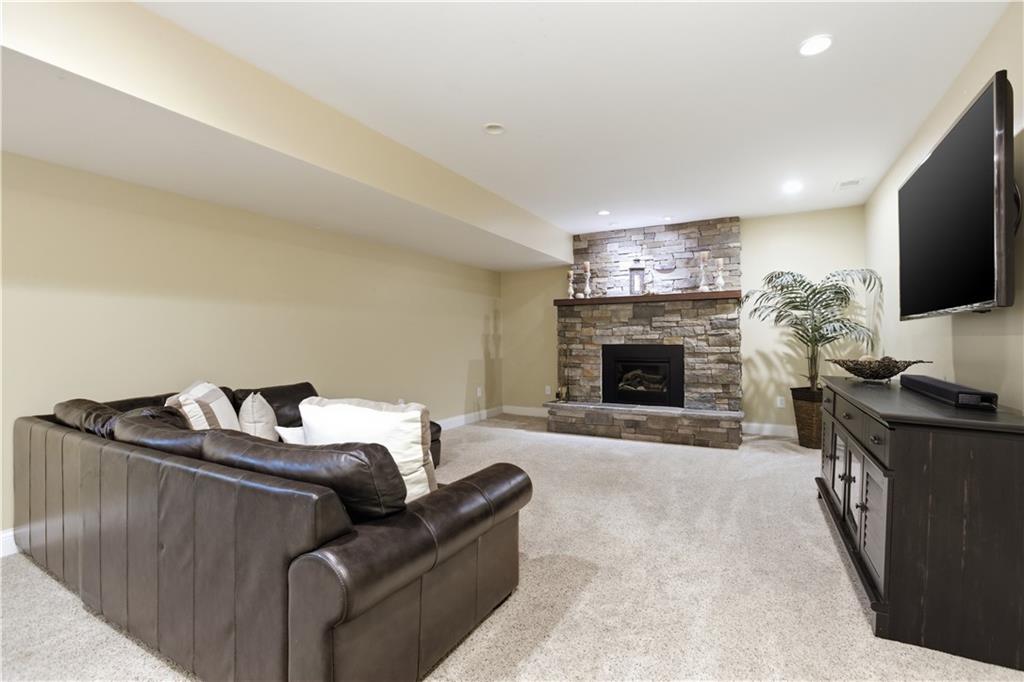280 Sienna Trail Venetia, PA 15367 - Photo 28 of 37 a living room with furniture and a fireplace