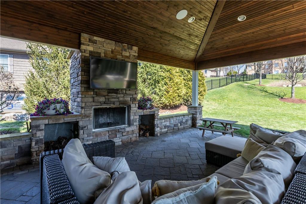 280 Sienna Trail Venetia, PA 15367 - Photo 4 of 37 a outdoor space with patio fireplace furniture and a garden