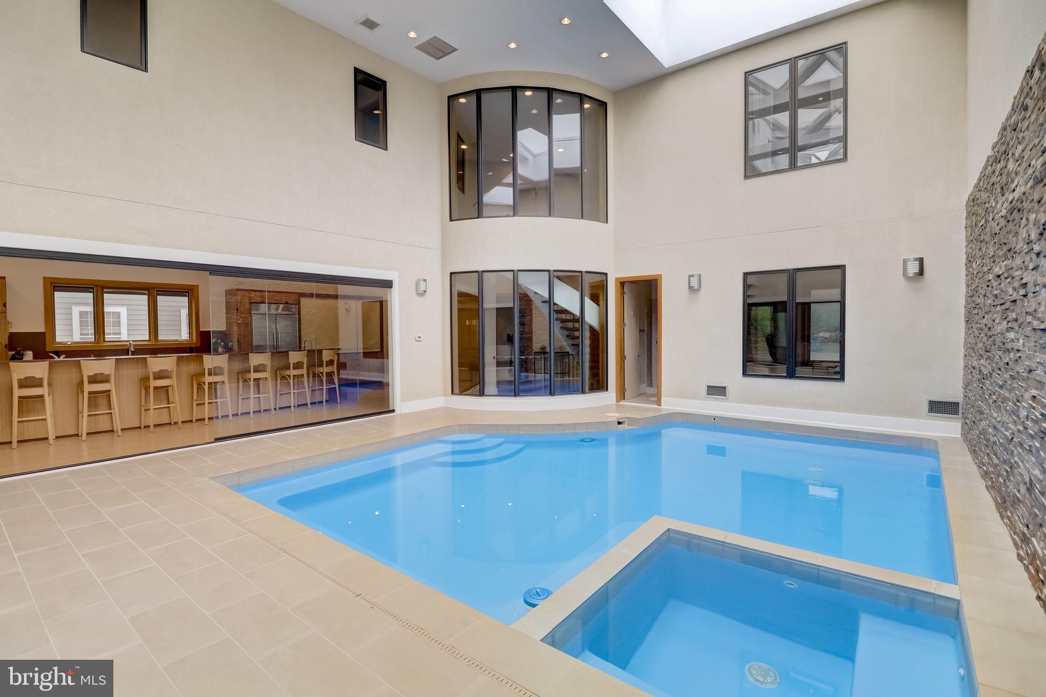 1617 Kirby Road McLean, VA 22101 - Photo 8 of 86 COLLAPSING MULTI PANEL GLASS DOORS