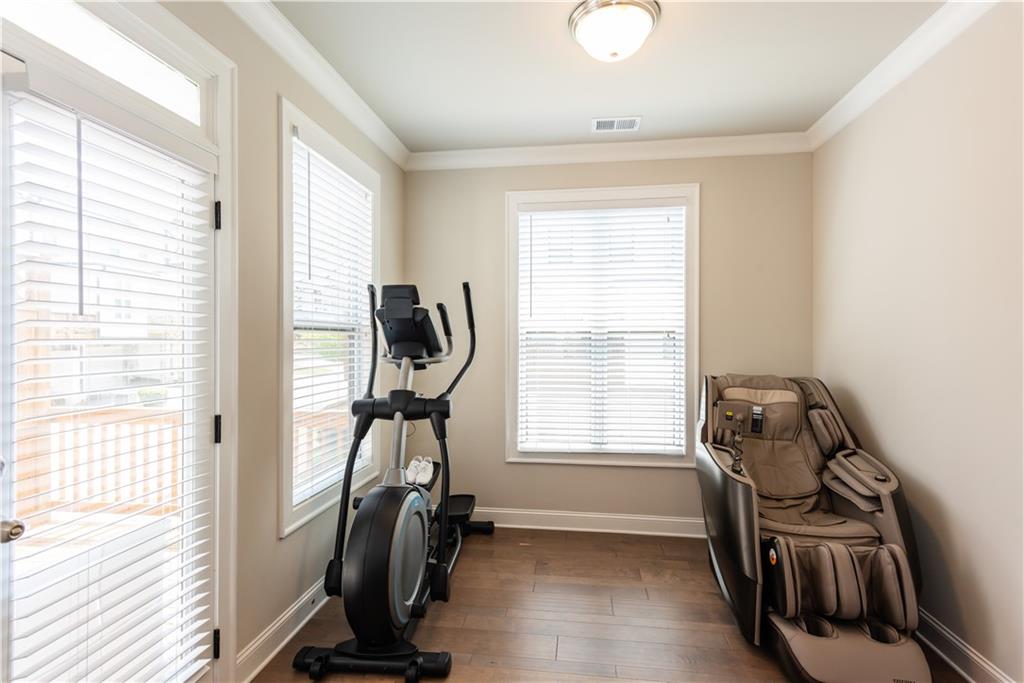 5247 Cresslyn Ridge Alpharetta, GA 30005 - Photo 18 of 38 a view of a room with gym equipment