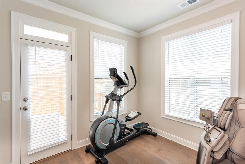 5247 Cresslyn Ridge Alpharetta, GA 30005 - Photo 19 of 38 a view of a room with gym equipment