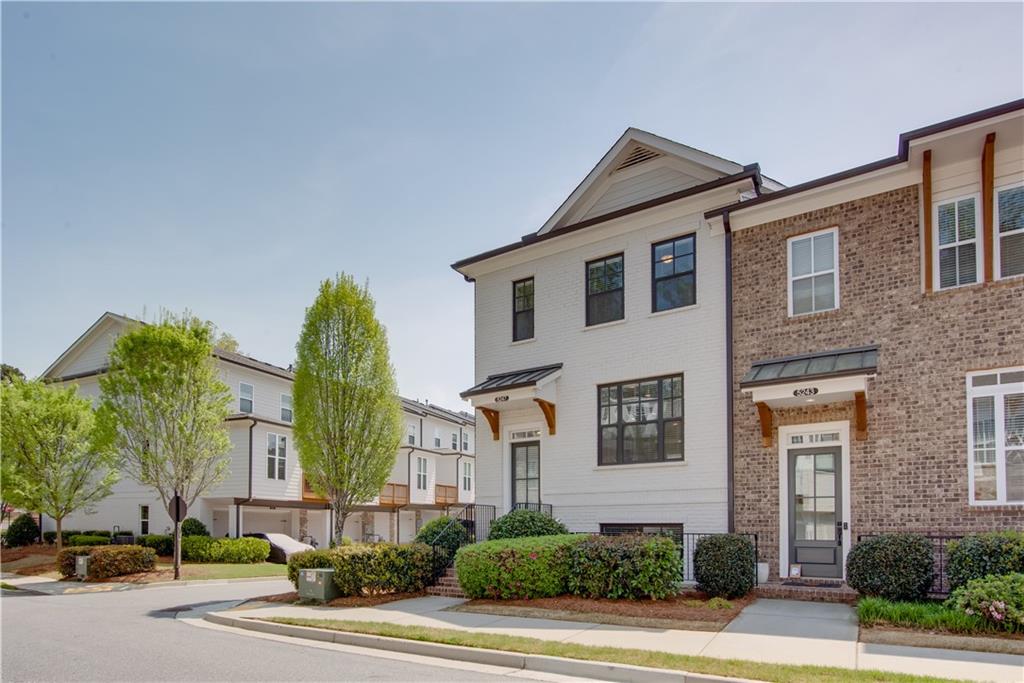 5247 Cresslyn Ridge Alpharetta, GA 30005 - Photo 2 of 38 a front view of a house with a yard