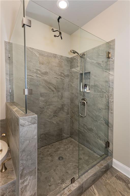 5247 Cresslyn Ridge Alpharetta, GA 30005 - Photo 29 of 38 a bathroom with a shower