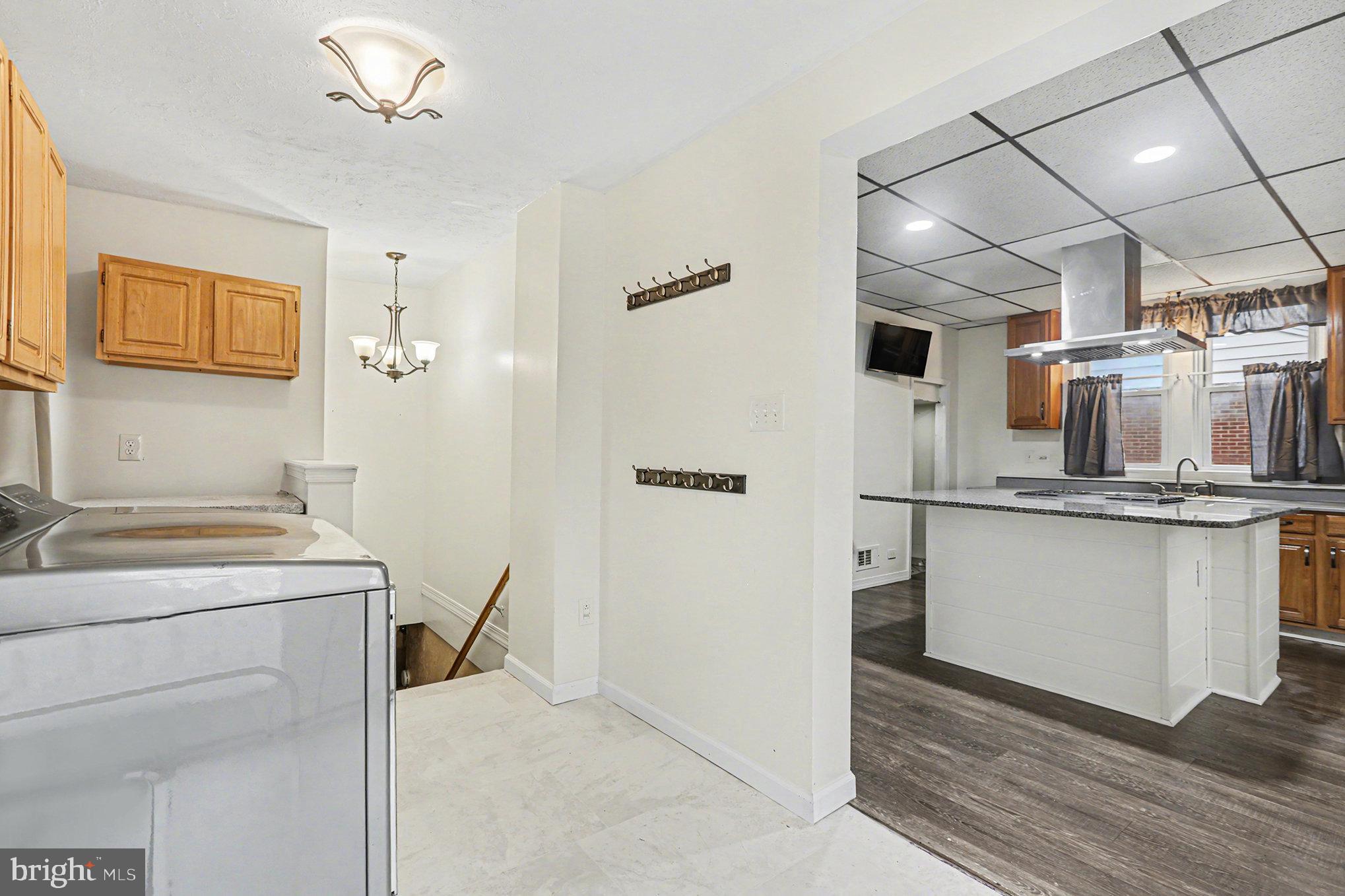 458 Highland Street Harrisburg, PA 17113 - Photo 15 of 31 a kitchen with a refrigerator and countertop