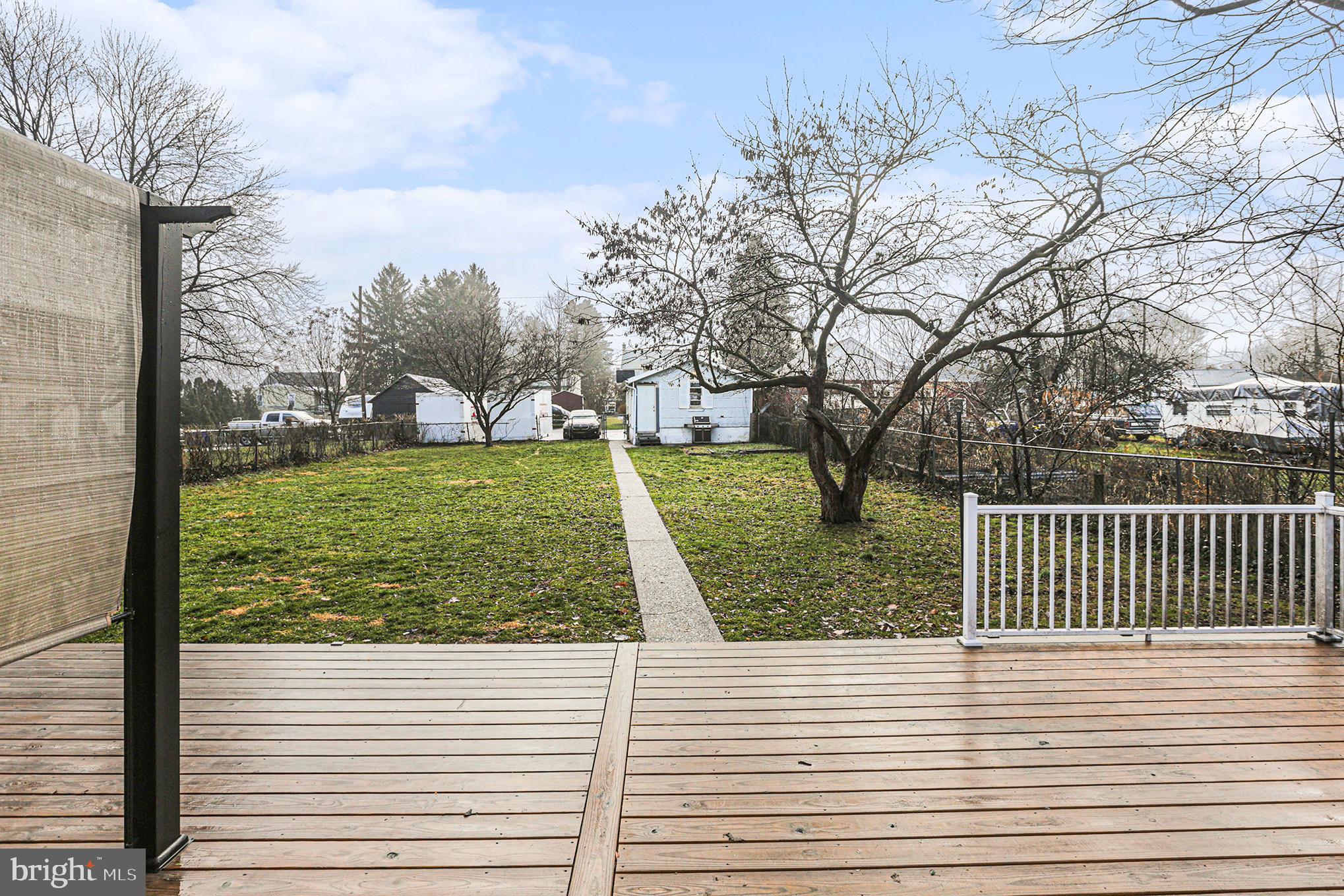 458 Highland Street Harrisburg, PA 17113 - Photo 25 of 31 a view of a yard with large trees