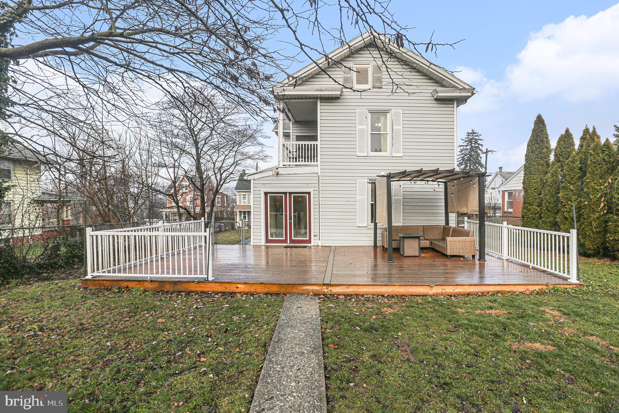 458 Highland Street Harrisburg, PA 17113 - Photo 27 of 31 a view of a house with backyard and a garden