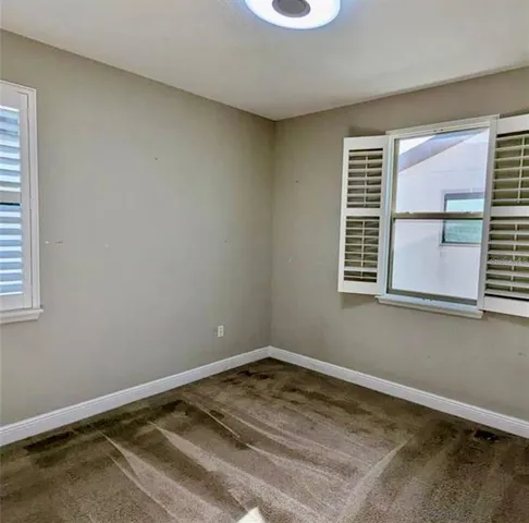 a view of a room with a window