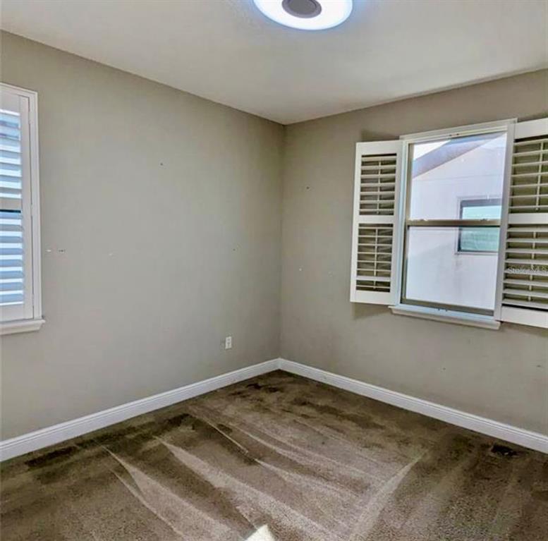 8582 Powder Ridge Trail Windermere, FL 34786 - Photo 19 of 37 a view of a room with a window