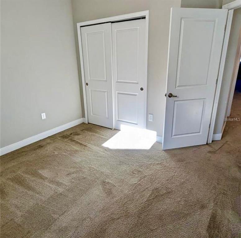 8582 Powder Ridge Trail Windermere, FL 34786 - Photo 22 of 37 a view of an empty room