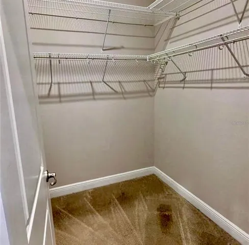 a view of a room with racks on the wall