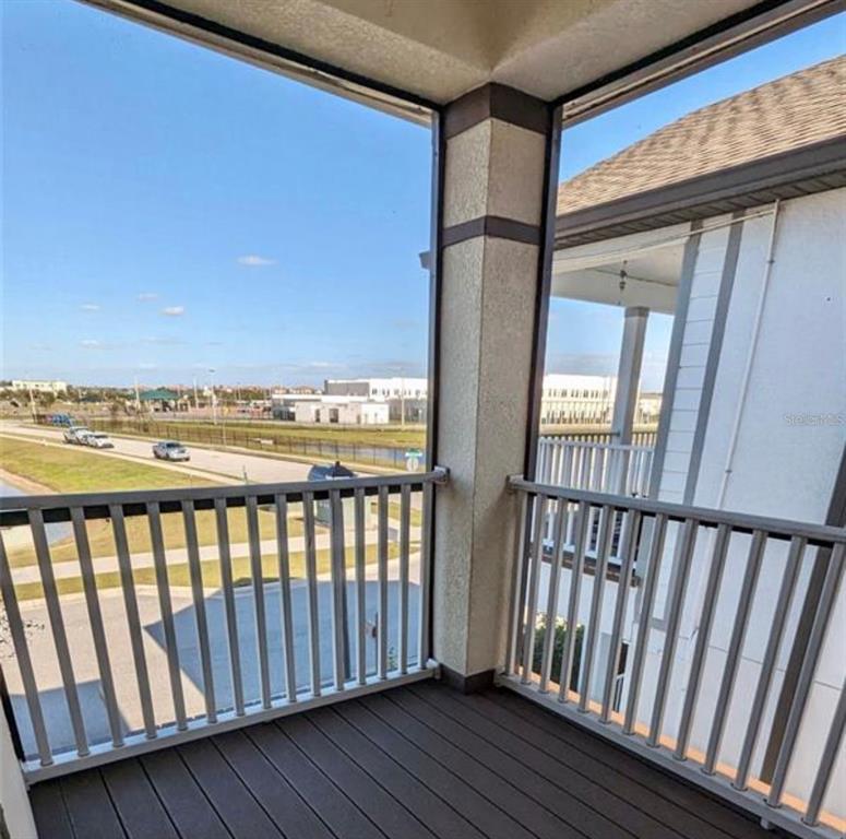 8582 Powder Ridge Trail Windermere, FL 34786 - Photo 36 of 37 a view of a balcony with wooden floor