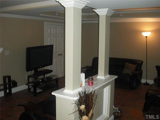 2209 Rock Quarry Road Raleigh, NC 27610 - Photo 15 of 25 a room with storage and utility
