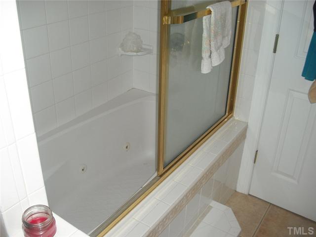 2209 Rock Quarry Road Raleigh, NC 27610 - Photo 19 of 25 a bathroom with a shower
