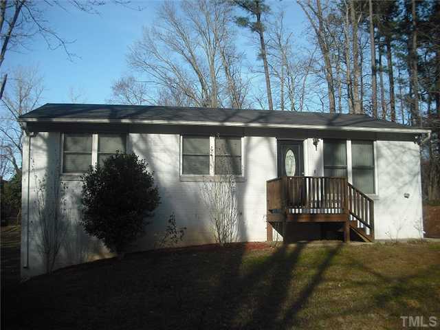 2209 Rock Quarry Road Raleigh, NC 27610 - Photo 25 of 25 a view of backyard with deck and wooden floor