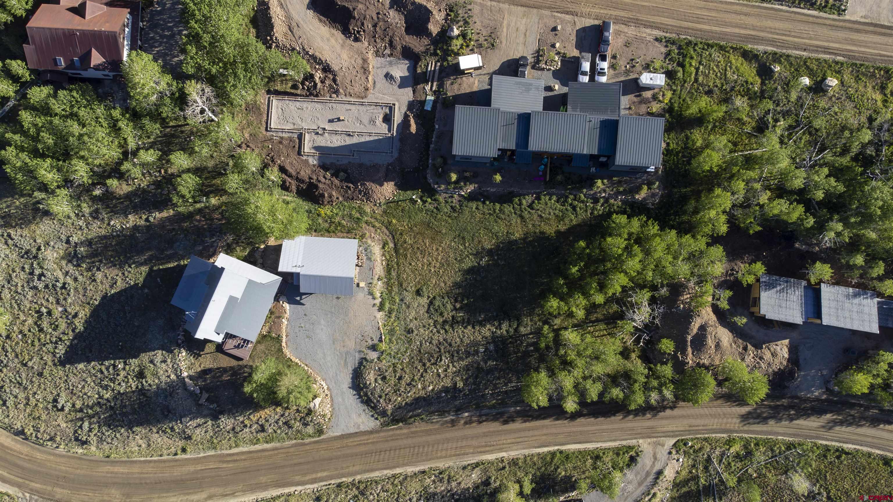 451 Zeligman Street Crested Butte, CO 81224 - Photo 8 of 10 an aerial view of a house with a yard and lake view