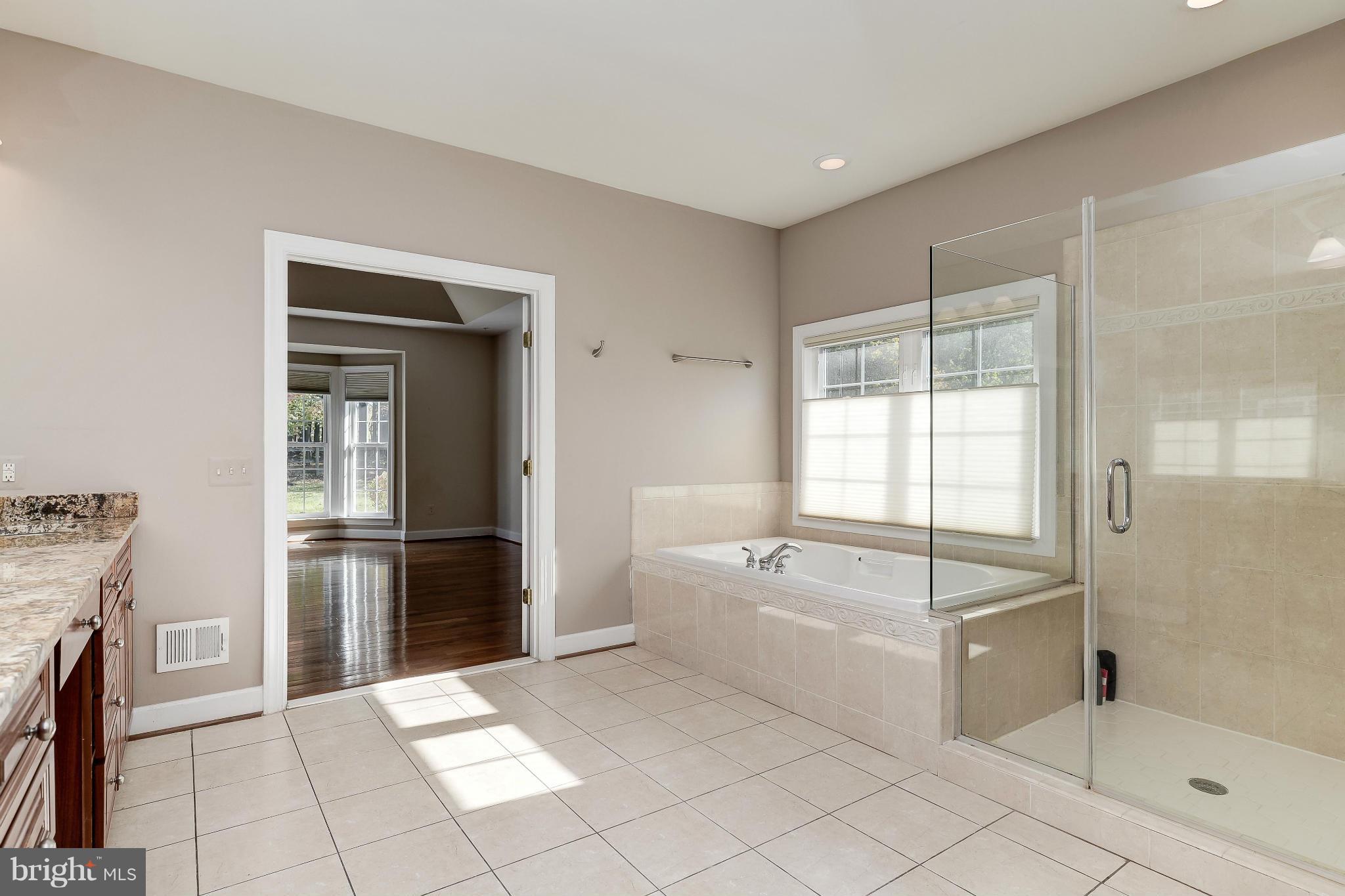 1404 Meadowsweet Drive Sandy Spring, MD 20860 - Photo 17 of 29 Separate Tub And Shower With Seamless Door