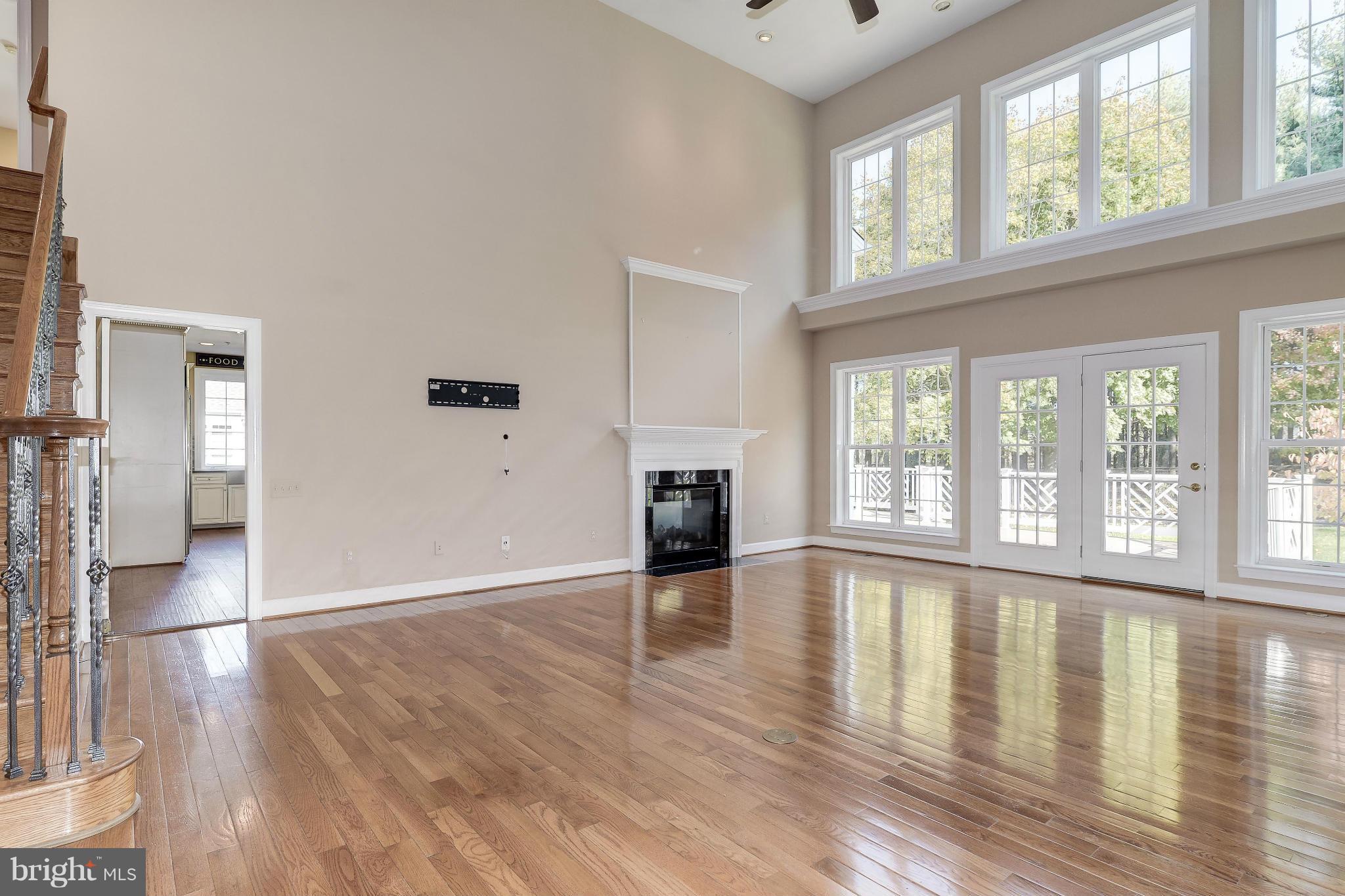1404 Meadowsweet Drive Sandy Spring, MD 20860 - Photo 10 of 29 Great Room With French Doors To Expansive Deck