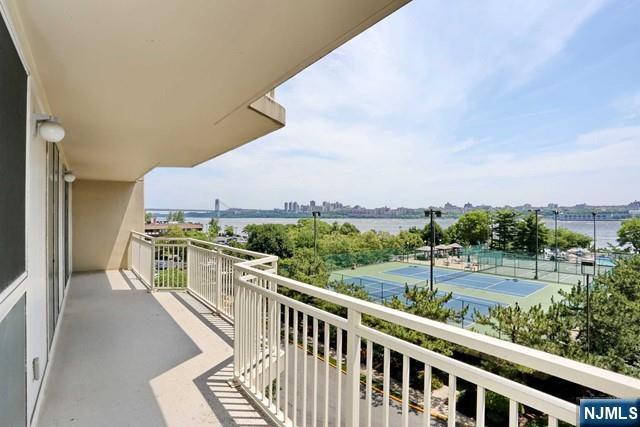 1055 River, Unit 506 Edgewater, NJ 07020 - Photo 1 of 25 a view of a city from a balcony
