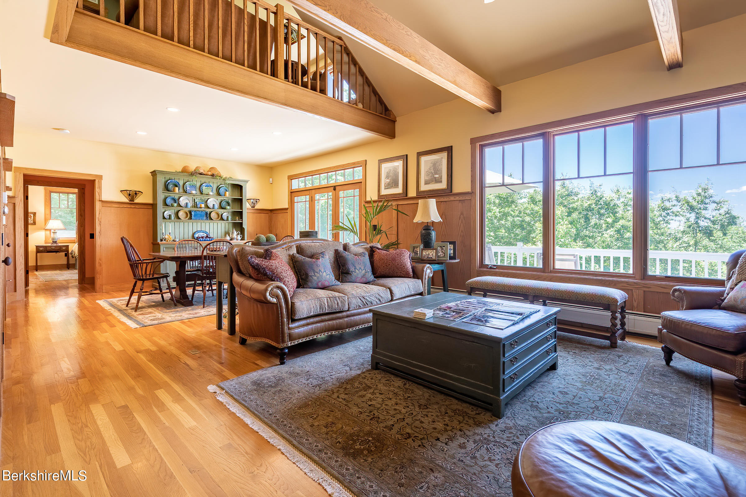 99 Hupi Road Monterey, MA 01245 - Photo 12 of 43 a living room with furniture and a large window