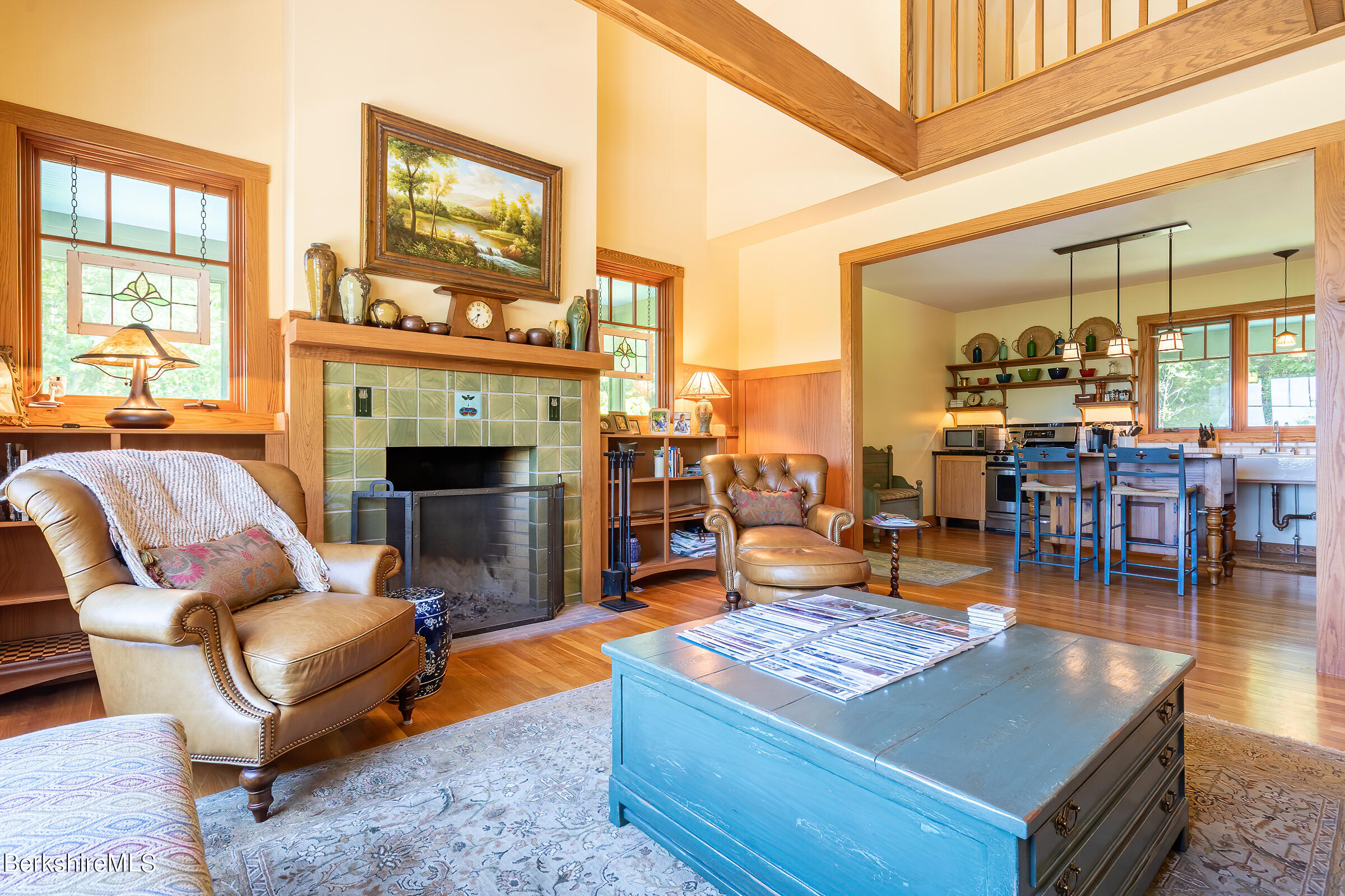 99 Hupi Road Monterey, MA 01245 - Photo 15 of 43 a living room with furniture a fireplace and floor to ceiling windows