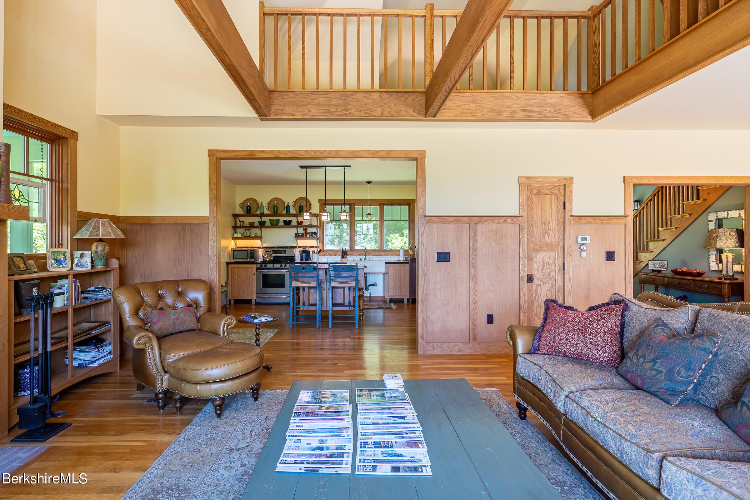 99 Hupi Road Monterey, MA 01245 - Photo 16 of 43 a living room with furniture a rug and a floor to ceiling window