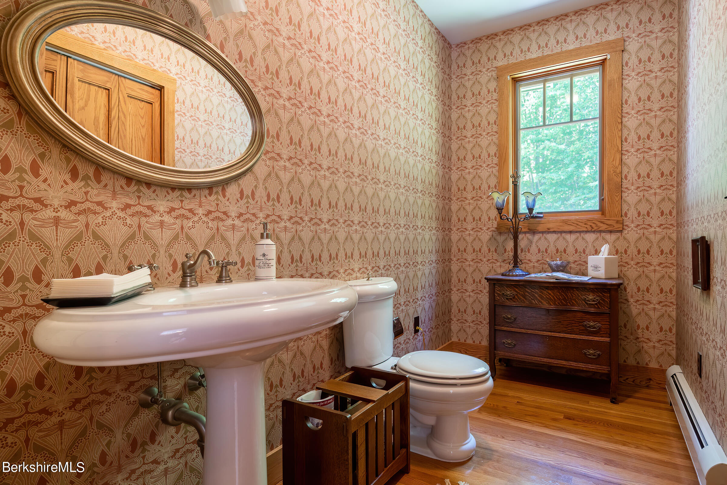 99 Hupi Road Monterey, MA 01245 - Photo 19 of 43 a bathroom with a sink a toilet and mirror