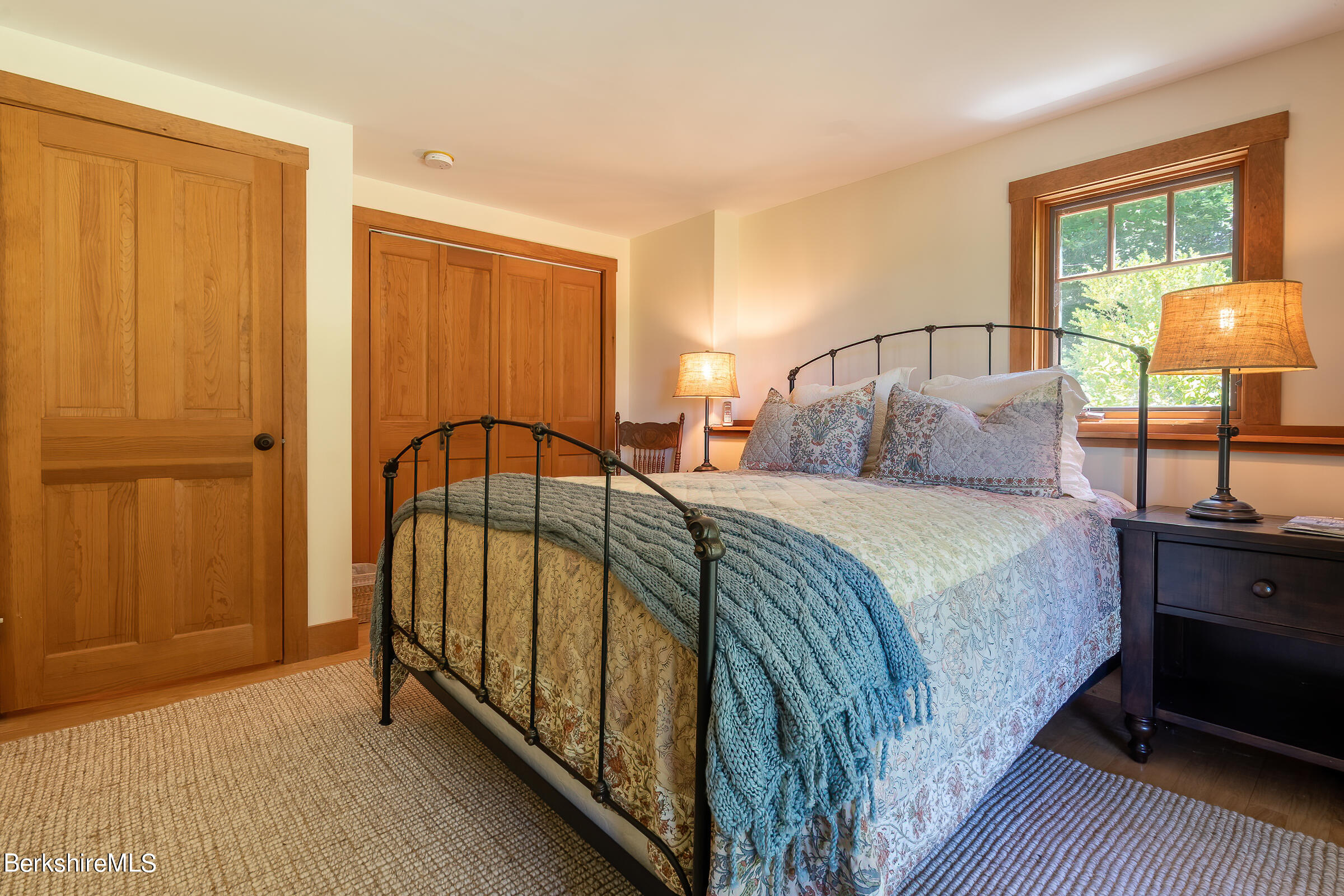 99 Hupi Road Monterey, MA 01245 - Photo 25 of 43 a bedroom with a bed and a window