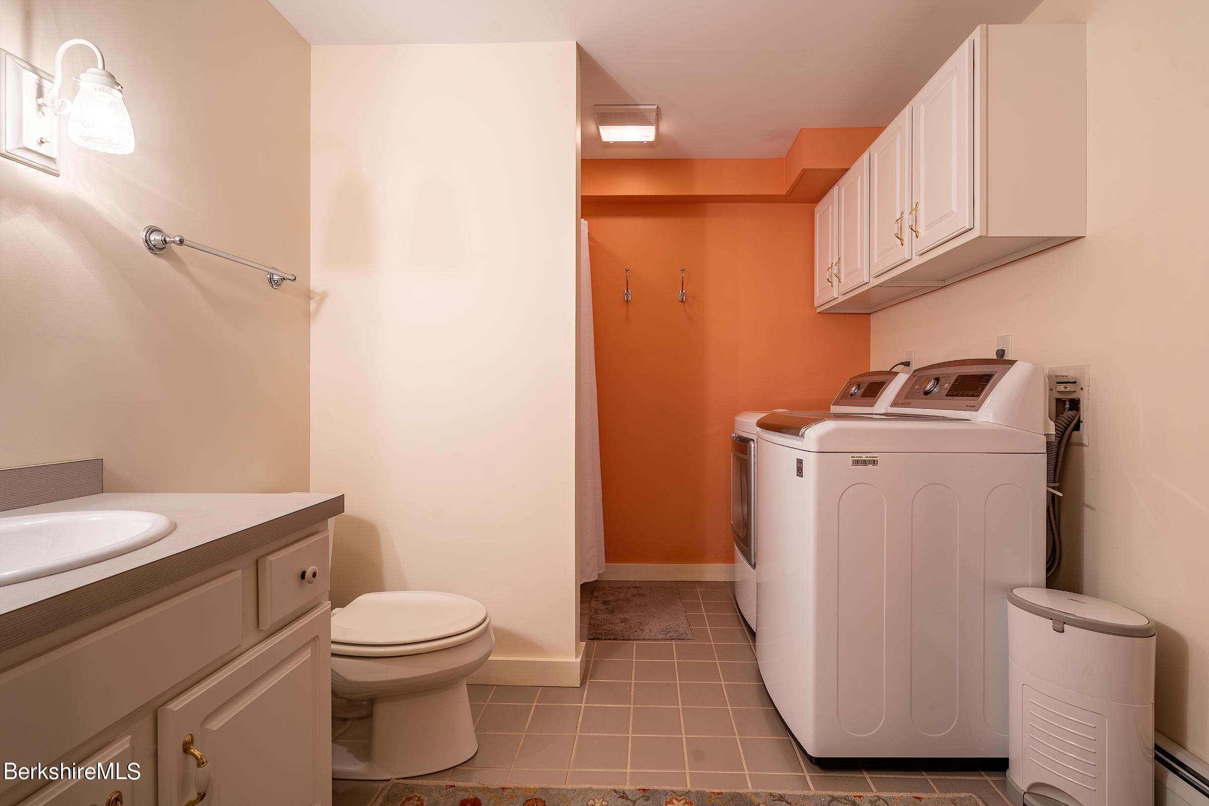 99 Hupi Road Monterey, MA 01245 - Photo 30 of 43 a bathroom with a toilet a sink and a bathtub