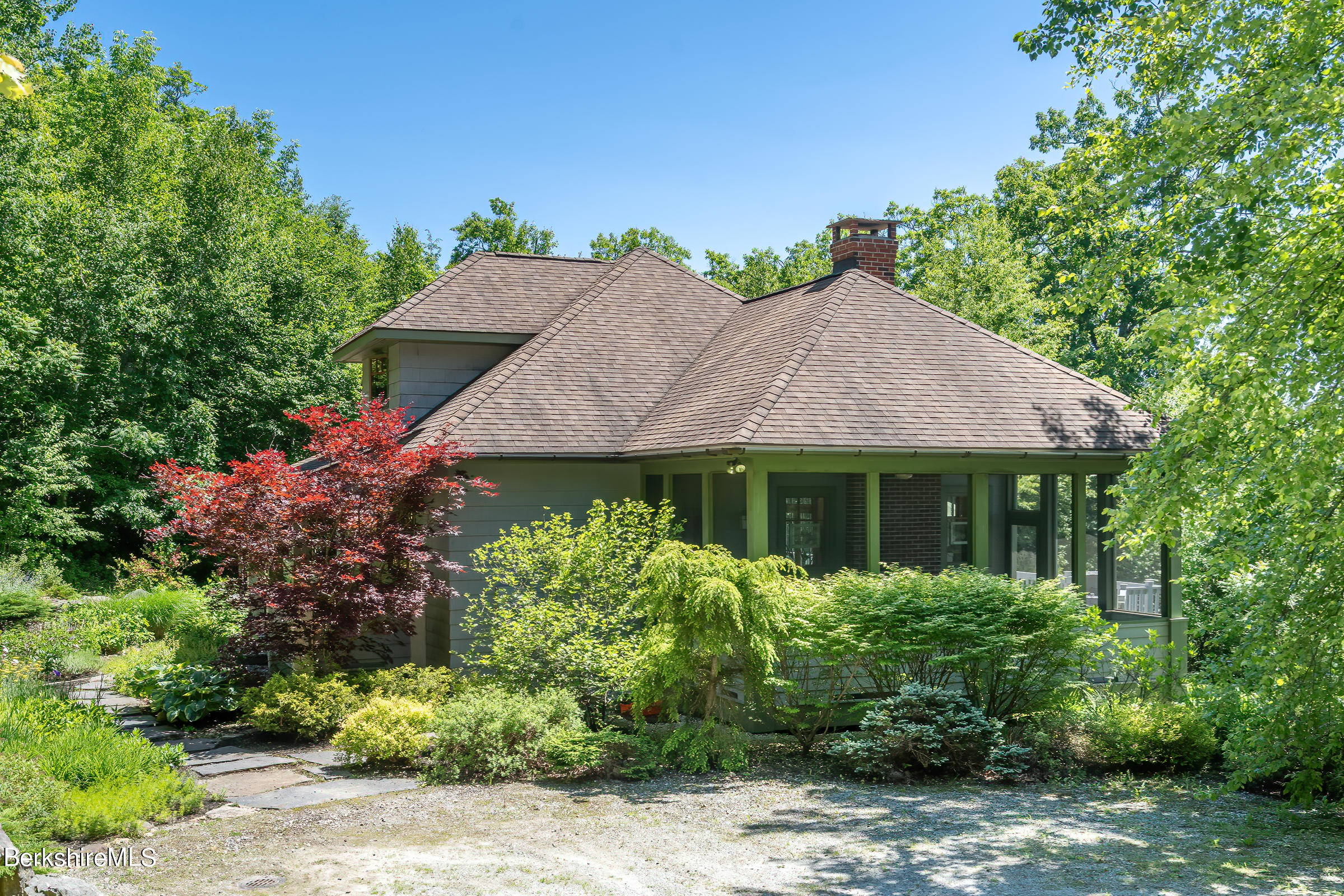 99 Hupi Road Monterey, MA 01245 - Photo 33 of 43 front view of a house with a yard