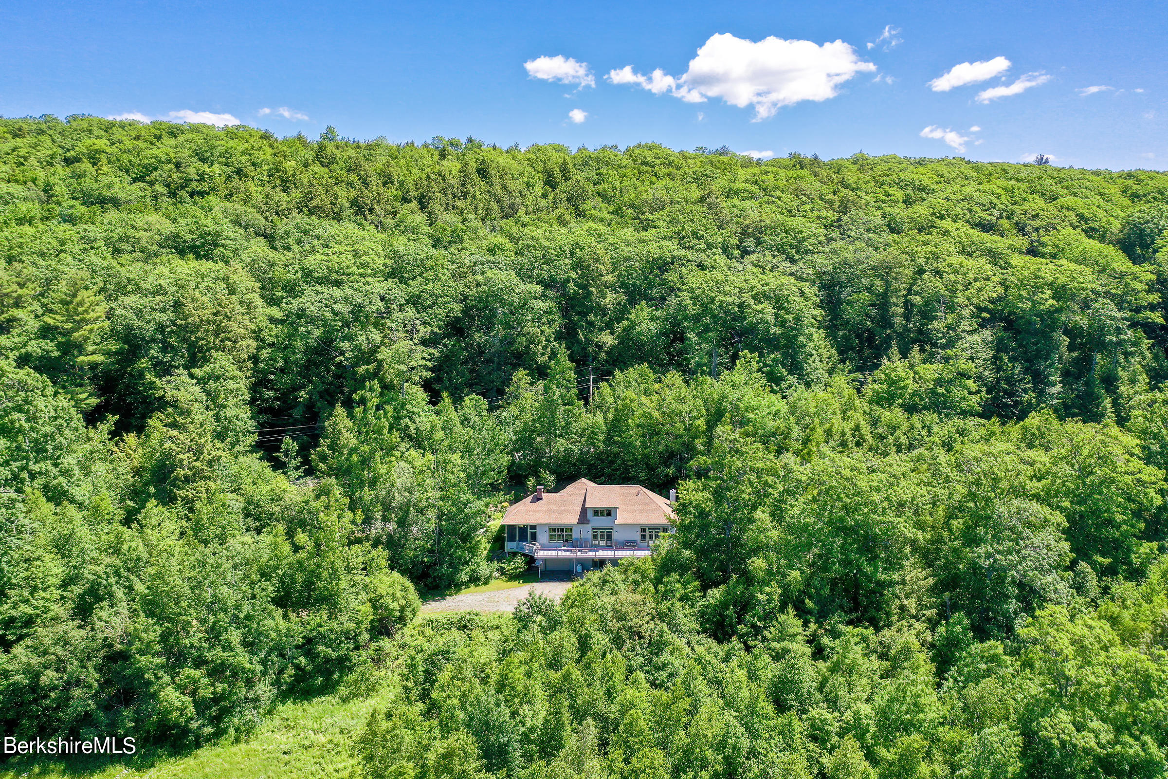 99 Hupi Road Monterey, MA 01245 - Photo 34 of 43 a view of a garden