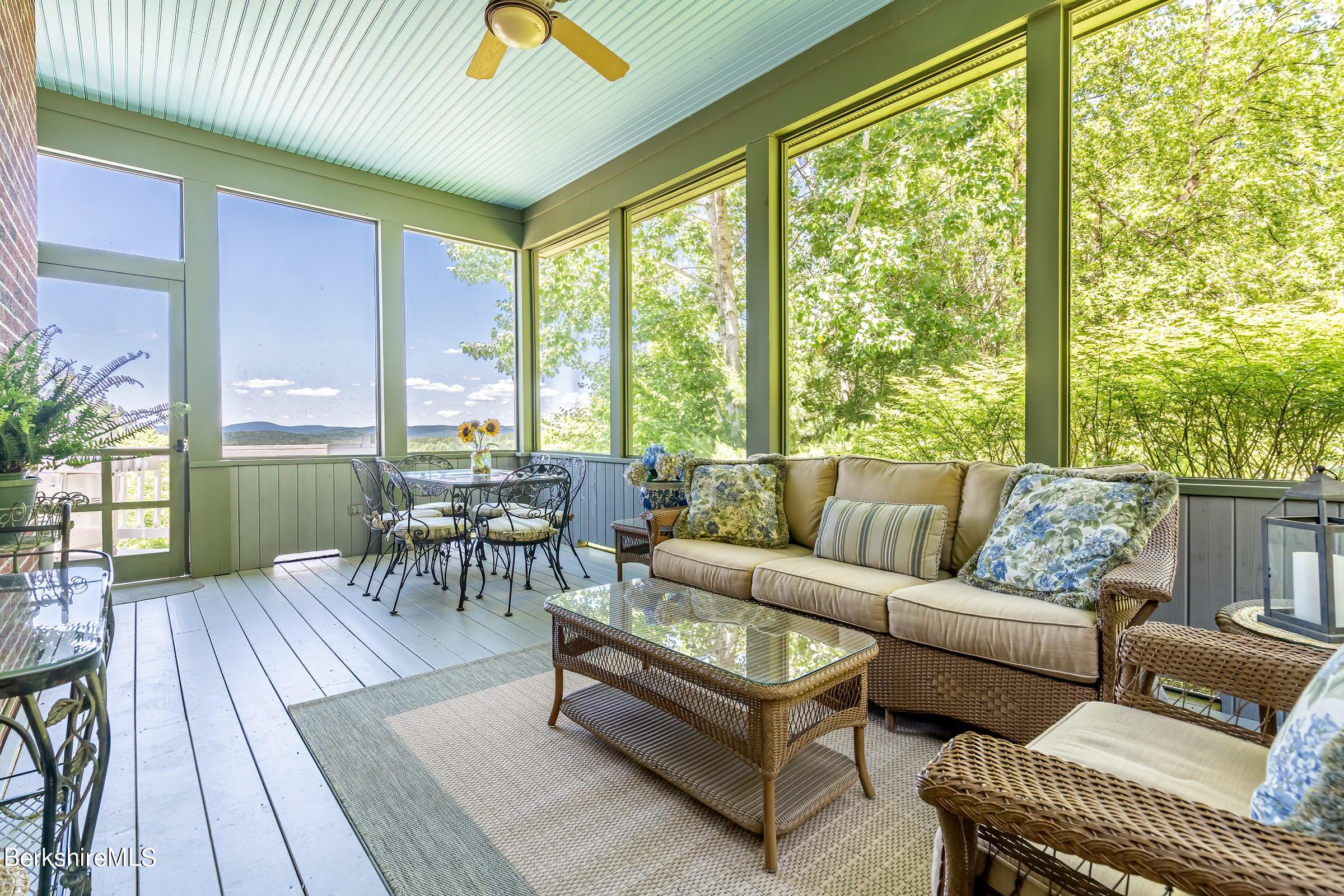 99 Hupi Road Monterey, MA 01245 - Photo 7 of 43 a living room with furniture and a large window