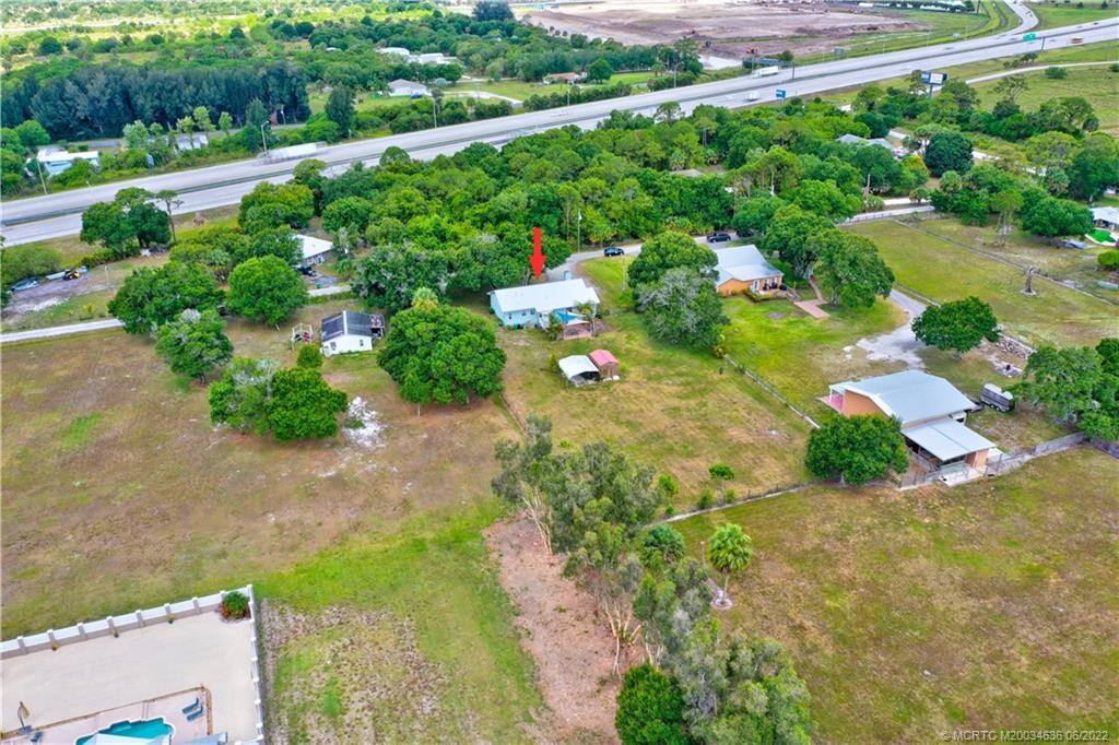 6385 Peterson Road Fort Pierce, FL 34947 - Photo 54 of 58 a view of a garden with a lake view