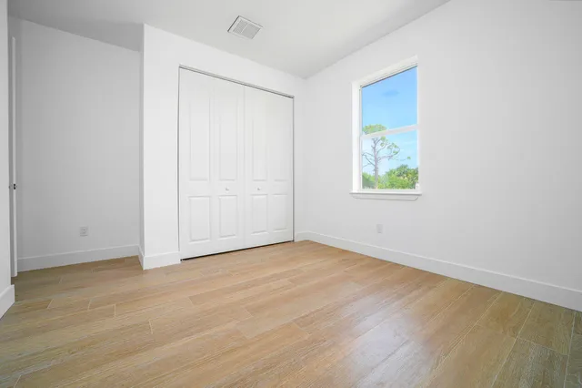 an empty room with window