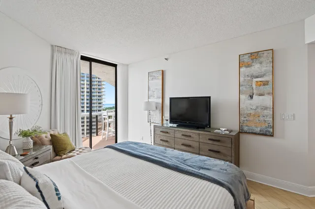 a bathroom with a double vanity sink mirror and toilet