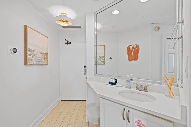 a city view from balcony with seating space