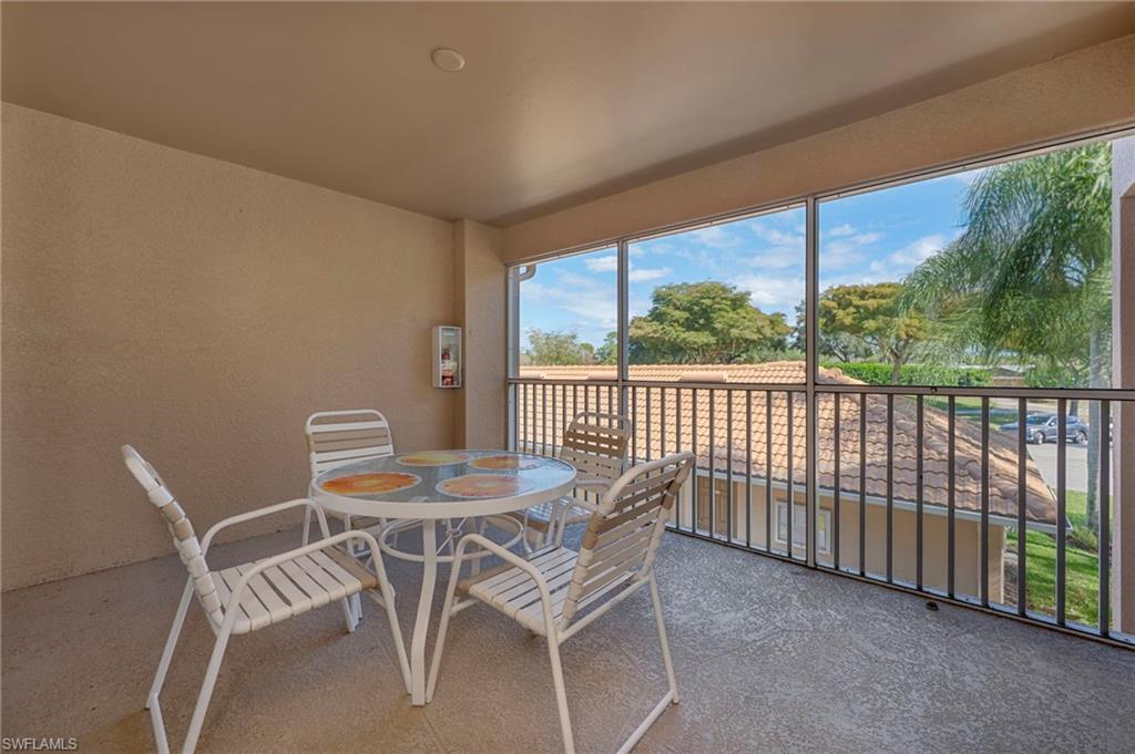 3890 Sawgrass Way, Unit 2324 Naples, FL 34112 - Photo 16 of 18 Front Screened Porch