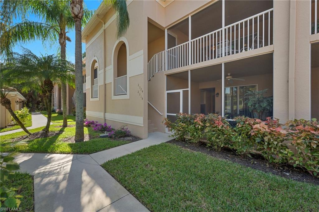 3890 Sawgrass Way, Unit 2324 Naples, FL 34112 - Photo 17 of 18 Entry to Second Floor