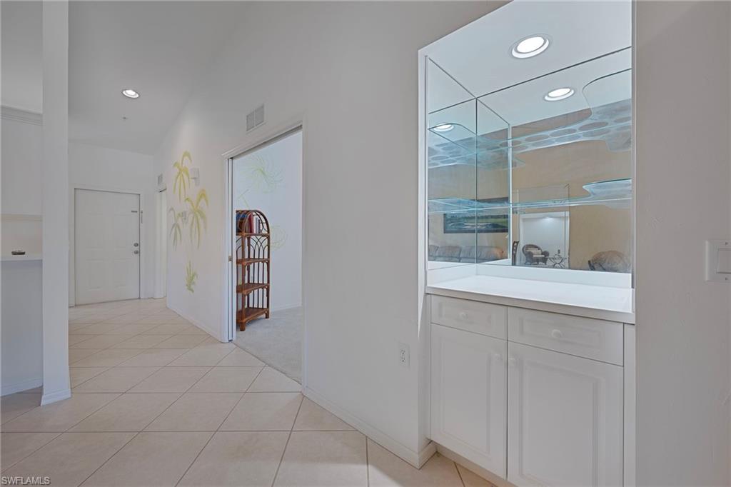 3890 Sawgrass Way, Unit 2324 Naples, FL 34112 - Photo 10 of 18 Bar, Den and Foyer