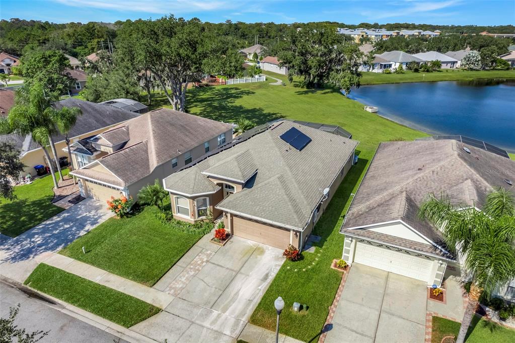 10232 Andover Point Circle Orlando, FL 32825 - Photo 29 of 33 an aerial view of a house with garden space and ocean view