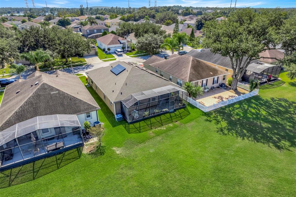 10232 Andover Point Circle Orlando, FL 32825 - Photo 30 of 33 an aerial view of a house with a garden and pool