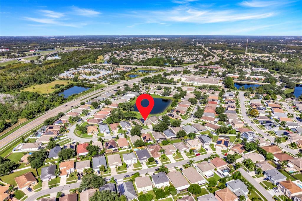 10232 Andover Point Circle Orlando, FL 32825 - Photo 32 of 33 an aerial view of residential building with parking space