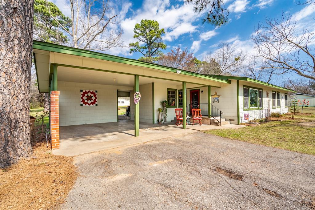609 East Quitman Street Alba, TX 75410 - Photo 6 of 34 a view of a house with basketball court