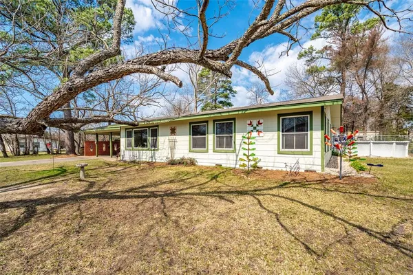 a front view of a house with a patio